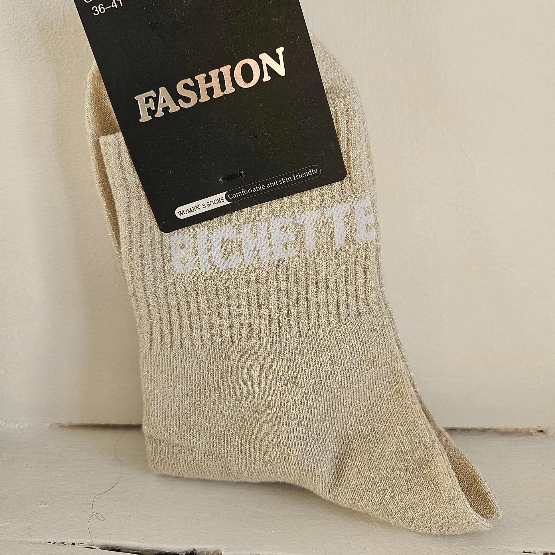 1 paire de chaussettes à paillettes beiges