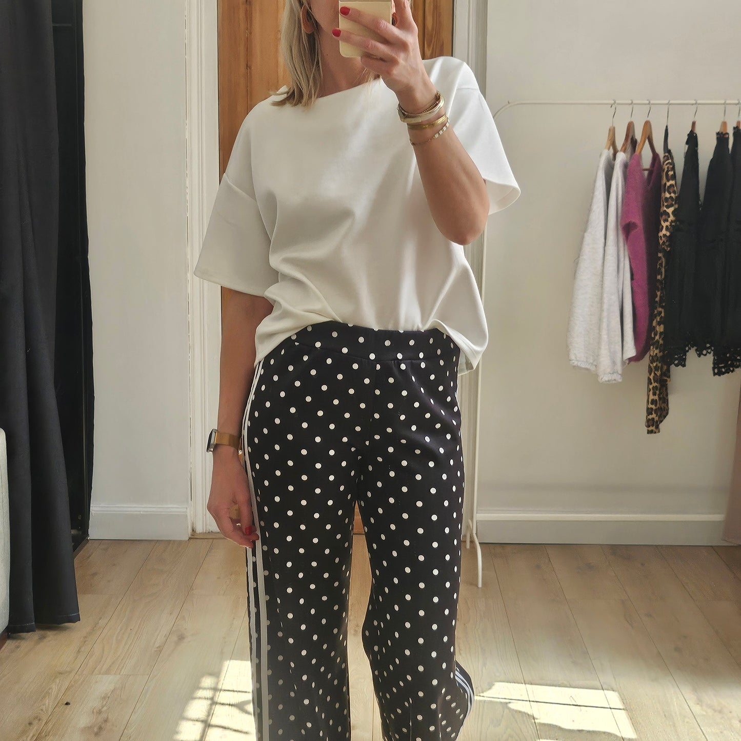 Pantalon noir à pois