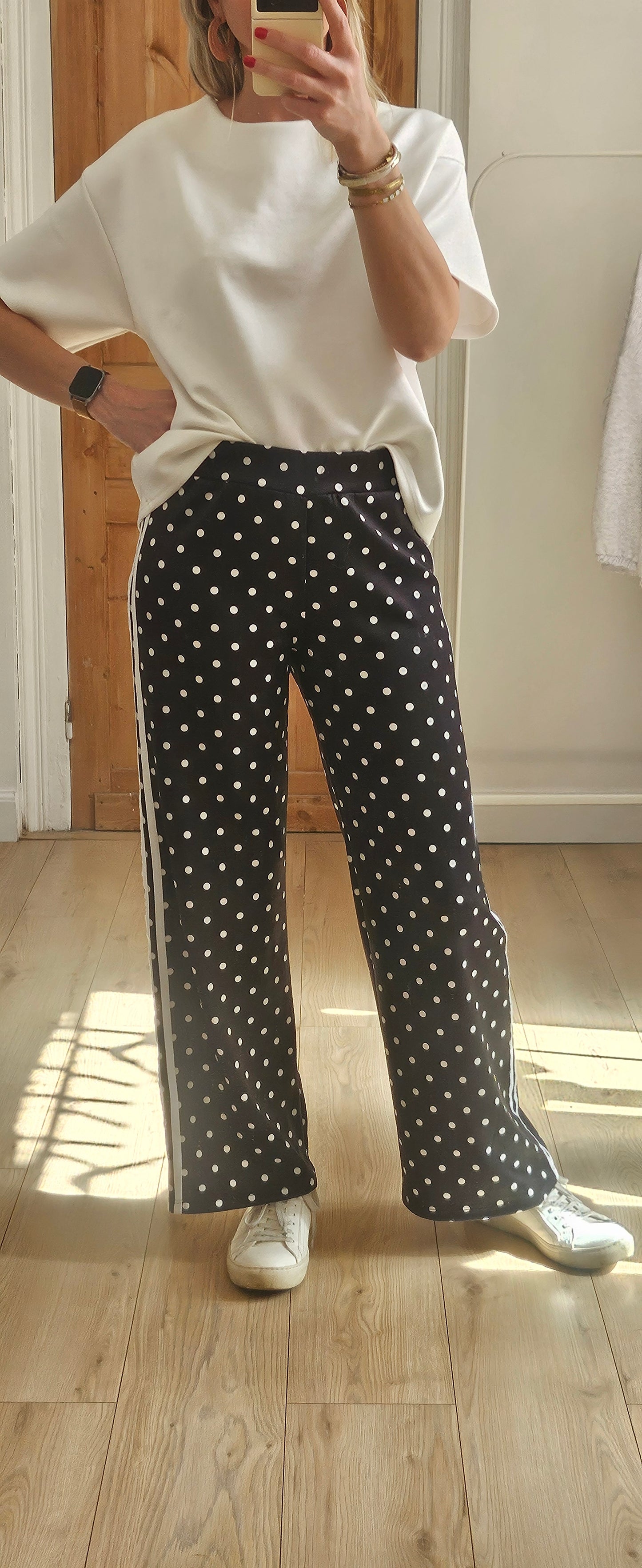 Pantalon noir à pois